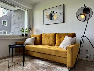 Ein Sitzbereich in der Unterkunft Zentrales Apartment am Theater in Marl