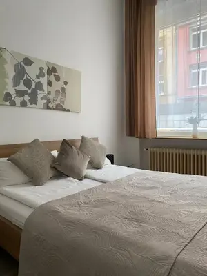 Ein Bett oder Betten in einem Zimmer der Unterkunft Appartement Nähe City