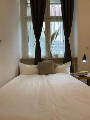 Ein Bett oder Betten in einem Zimmer der Unterkunft Appartement Nähe City