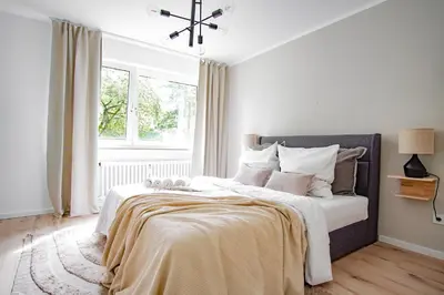 Ein Bett oder Betten in einem Zimmer der Unterkunft HOMEFY - Feel Good Apartment