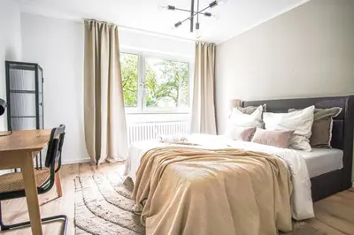 Ein Bett oder Betten in einem Zimmer der Unterkunft HOMEFY - Feel Good Apartment