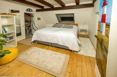 Ein Bett oder Betten in einem Zimmer der Unterkunft Feierabend im Grünen