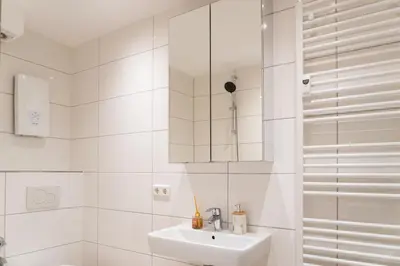Ein Badezimmer in der Unterkunft TOP! Gemütliches Studio-Apartment zentral, WLAN, Küche