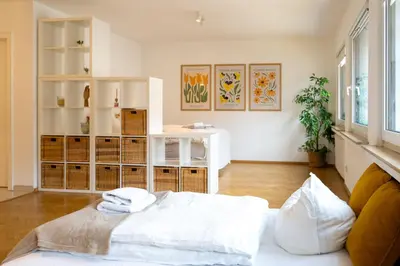 Ein Bett oder Betten in einem Zimmer der Unterkunft TOP! Gemütliches Studio-Apartment zentral, WLAN, Küche