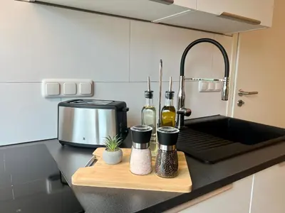Küche/Küchenzeile in der Unterkunft Design Apartment mit Balkon - Küche - Netflix