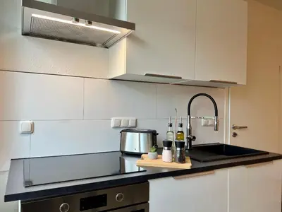 Küche/Küchenzeile in der Unterkunft Design Apartment mit Balkon - Küche - Netflix