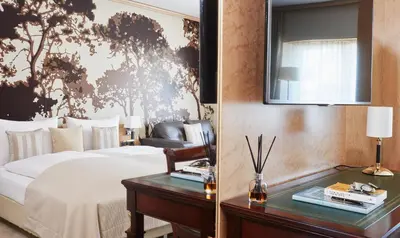 Ein Bett oder Betten in einem Zimmer der Unterkunft Living Hotel De Medici