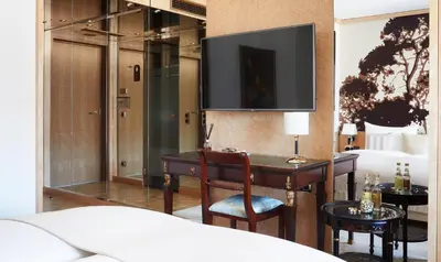 Ein Bett oder Betten in einem Zimmer der Unterkunft Living Hotel De Medici
