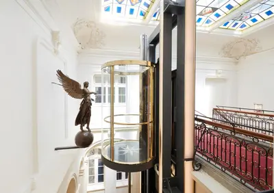 Ein Bett oder Betten in einem Zimmer der Unterkunft Living Hotel De Medici