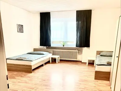 Ein Bett oder Betten in einem Zimmer der Unterkunft Chic Apartments Hagen