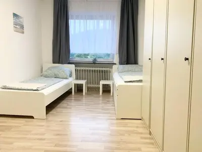Ein Bett oder Betten in einem Zimmer der Unterkunft Chic Apartments Hagen