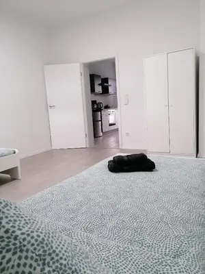 Ein Bett oder Betten in einem Zimmer der Unterkunft estrella24 LIVING ROOMS Namibia