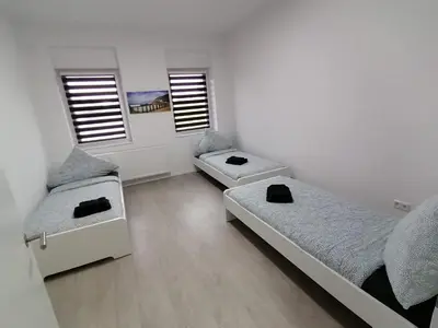 Ein Bett oder Betten in einem Zimmer der Unterkunft estrella24 LIVING ROOMS Namibia