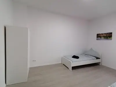 Ein Bett oder Betten in einem Zimmer der Unterkunft estrella24 LIVING ROOMS Venedig
