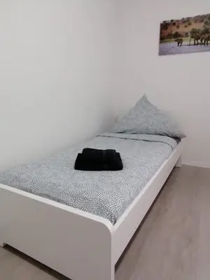 Ein Bett oder Betten in einem Zimmer der Unterkunft estrella24 LIVING ROOMS Venedig