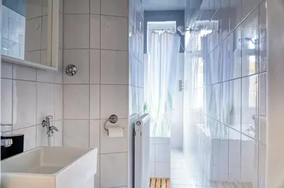 Ein Badezimmer in der Unterkunft HOMEFY - Design Apartment