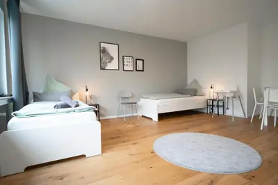 Ein Bett oder Betten in einem Zimmer der Unterkunft Cozy balcony apartment in Essen-Kupferdreh