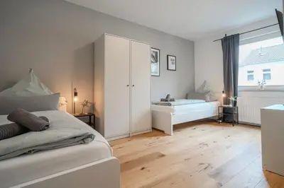 Ein Bett oder Betten in einem Zimmer der Unterkunft Cozy balcony apartment in Essen-Kupferdreh