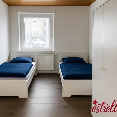 Ein Bett oder Betten in einem Zimmer der Unterkunft estrella24 LIVING ROOMS Kairo
