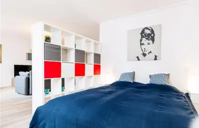 Ein Bett oder Betten in einem Zimmer der Unterkunft HOMEFY OLDTOWN APARTMENT - 6 people - 2 bath - balcony - top location