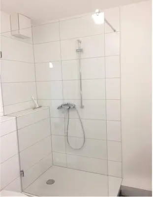 Ein Badezimmer in der Unterkunft HOMEFY OLDTOWN APARTMENT - 6 people - 2 bath - balcony - top location