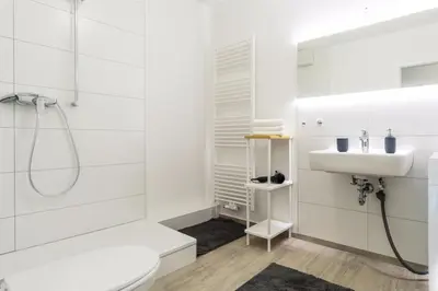 Ein Badezimmer in der Unterkunft HOMEFY OLDTOWN APARTMENT - 6 people - 2 bath - balcony - top location