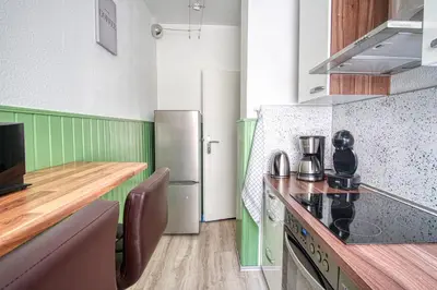 Küche/Küchenzeile in der Unterkunft HOMEFY - Sleep & Relax Apartment