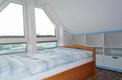 Ein Bett oder Betten in einem Zimmer der Unterkunft Unter den Sternen
