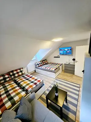 Ein Bett oder Betten in einem Zimmer der Unterkunft Pohl Fewo