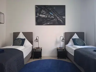 Ein Bett oder Betten in einem Zimmer der Unterkunft Stylish-City Loft-Zentral-Bahnhof-Elberfeld-W6