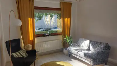 Ein Sitzbereich in der Unterkunft White Pearl II