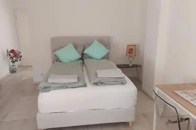 Ein Bett oder Betten in einem Zimmer der Unterkunft White Pearl II