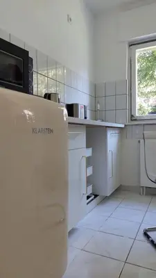 Küche/Küchenzeile in der Unterkunft White Pearl II