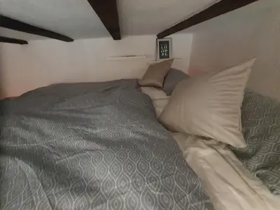 Ein Bett oder Betten in einem Zimmer der Unterkunft Zentral Duisburg