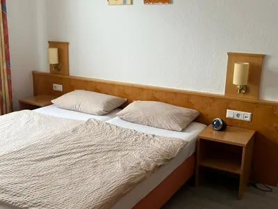 Ein Bett oder Betten in einem Zimmer der Unterkunft Brauhaus Hotel Ruetershoff