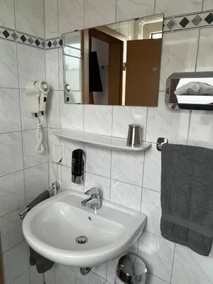 Ein Badezimmer in der Unterkunft Brauhaus Hotel Ruetershoff