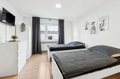 Ein Bett oder Betten in einem Zimmer der Unterkunft Unterkunft mit Balkon in Gelsenkirchen