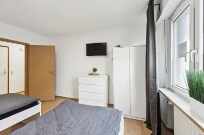 Ein Bett oder Betten in einem Zimmer der Unterkunft Unterkunft mit Balkon in Gelsenkirchen