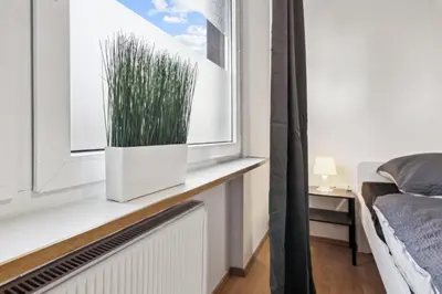 Ein Bett oder Betten in einem Zimmer der Unterkunft Unterkunft mit Balkon in Gelsenkirchen