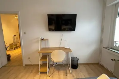 TV/Unterhaltungsangebot in der Unterkunft Apart54-Modern Design I Garden with Terrace I Smart TV I Free Parking I Free WiFi