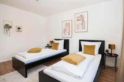 Ein Bett oder Betten in einem Zimmer der Unterkunft Kurzzeitglück 24h Self Check-In E01