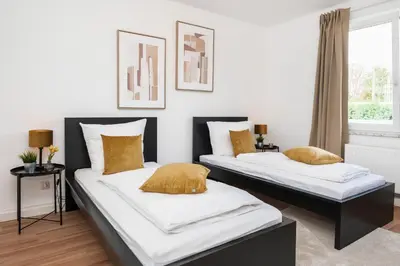 Ein Bett oder Betten in einem Zimmer der Unterkunft Kurzzeitglück 24h Self Check-In E01