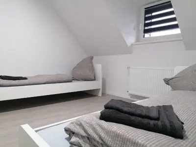 Ein Bett oder Betten in einem Zimmer der Unterkunft estrella24 LIVING ROOMS Santiago
