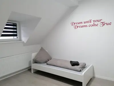 Ein Bett oder Betten in einem Zimmer der Unterkunft estrella24 LIVING ROOMS Santiago