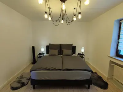 Ein Bett oder Betten in einem Zimmer der Unterkunft Grüne Oase Bochum