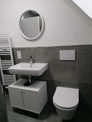 Ein Badezimmer in der Unterkunft estrella24 LIVING ROOMS Chita