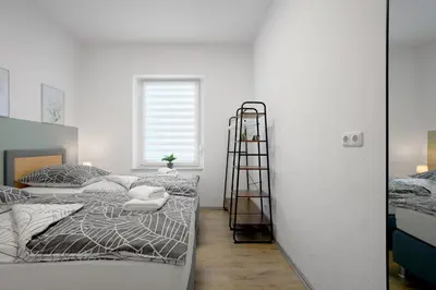 Ein Bett oder Betten in einem Zimmer der Unterkunft Rudi Homes Essen #1