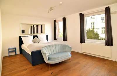 Ein Bett oder Betten in einem Zimmer der Unterkunft Victoria Altstadt Boardinghouse