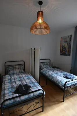 Ein Bett oder Betten in einem Zimmer der Unterkunft Ferienwohnung Hohenlimburg