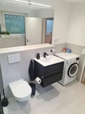 Ein Badezimmer in der Unterkunft Kernsan. Souterrain-Wohnung 60qm mit Pool Blick